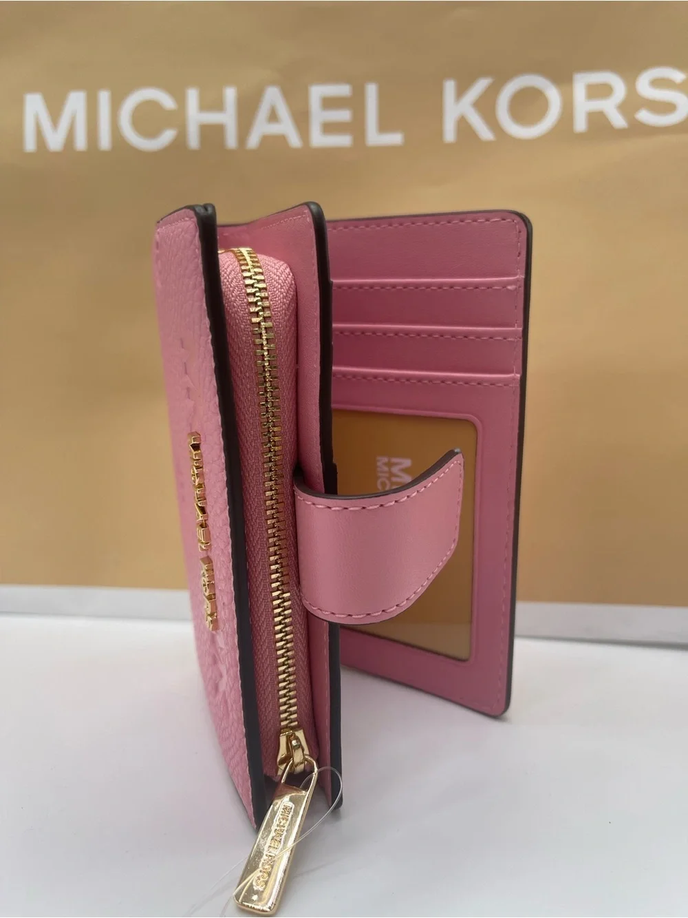MICHAEL KORS Jet Set Travel Medium MK Logo Debossed Bifold Wallet Carnation  NWT